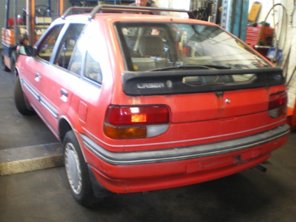 FORD LASER red