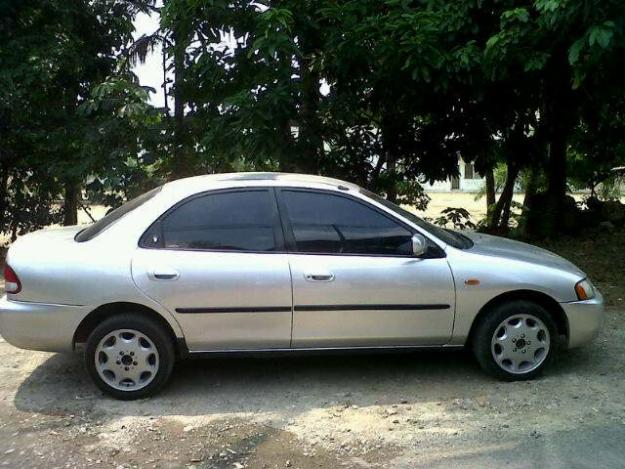 FORD LASER silver