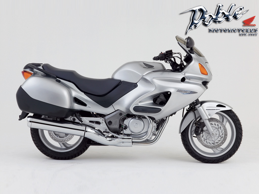 Honda nt650v. Хонда НТ 650 Девиль. Nt650v Deauville. Honda nt700v. Honda Deauville 650 клетка.