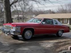 CADILLAC COUPE DE VILLE red