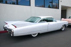 CADILLAC COUPE DE VILLE white