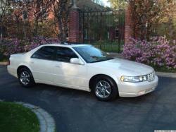 CADILLAC STS SEVILLE green