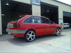 FORD LASER black