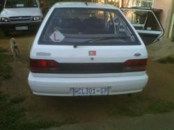 FORD LASER white