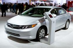 CHICAGO - FEB 12: The 2013 Honda Civic on display at the 2012 Chicago Auto Show. February 12, 2012 in Chicago, Illinois. by Yaro