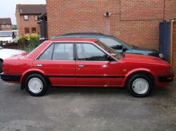 NISSAN BLUEBIRD red