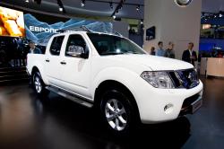 Moscow, Russia - August 25:  White Jeep Car Nissan Navara  On Display At Moscow International Exhibi by Rqs