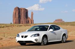 MONUMENT VALLEY, AZ - JUNE 22: Sales of Pontiac Grand Prix, pictured in an iconic desert setting in Monument Valley, Arizona, on June 22, 2008, are down because of high gas prices. by 1photo