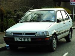 SUBARU JUSTY brown