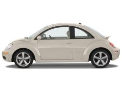 VOLKSWAGEN NEW BEETLE white